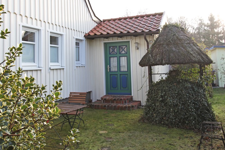 Entrance to the apartment in the original captain's house with its green-blue door